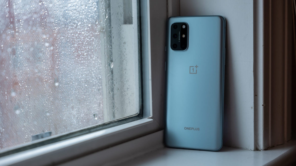 OnePlus 8T sitting on windowsil