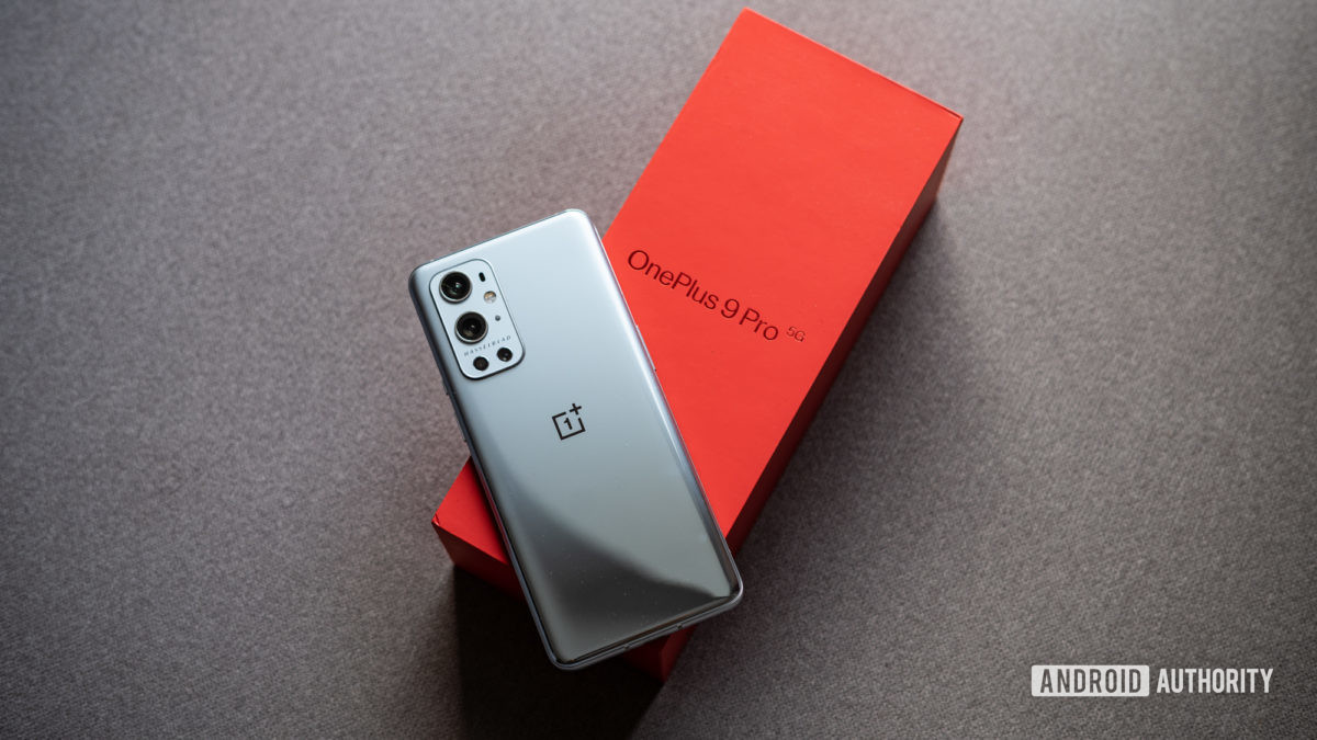 The OnePlus 9 Pro rear view on its red box.