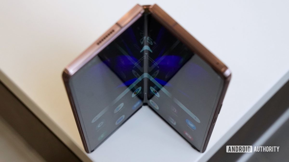 The Samsung Galaxy Z Fold 2 opened up like a book, standing on a table.