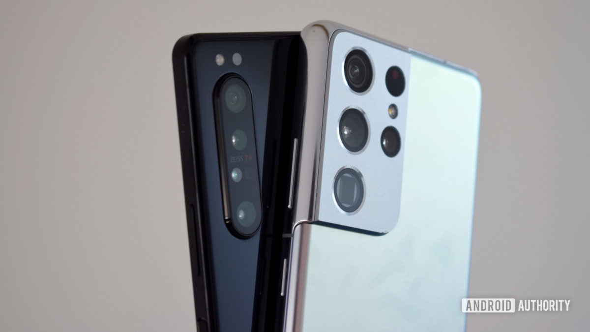 The Sony Xperia 1 II side by side with the Samsung Galaxy S21 Ultra showing the rear view and camera modules.