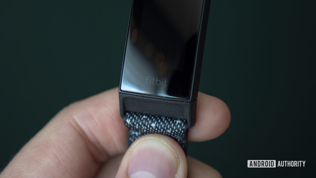 fitbit charge 4 review fitbit logo closeup