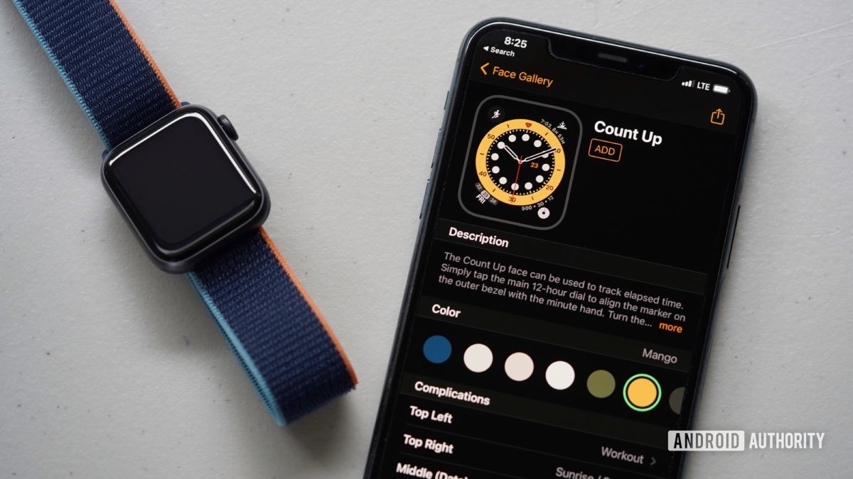 Apple Watch Series 6 and iPhone 11 lay on gray surface illustrating how to add an Apple Watch face in the Watch app