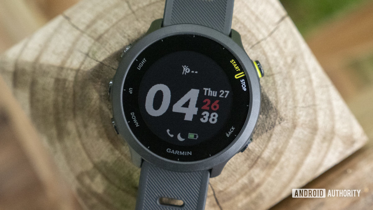 Garmin Forerunner 55 review watch face display on table 1