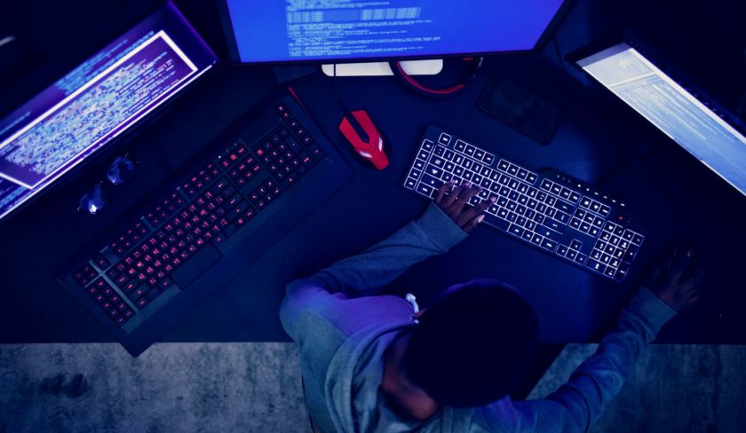 Man Hacking Keyboards Monitors