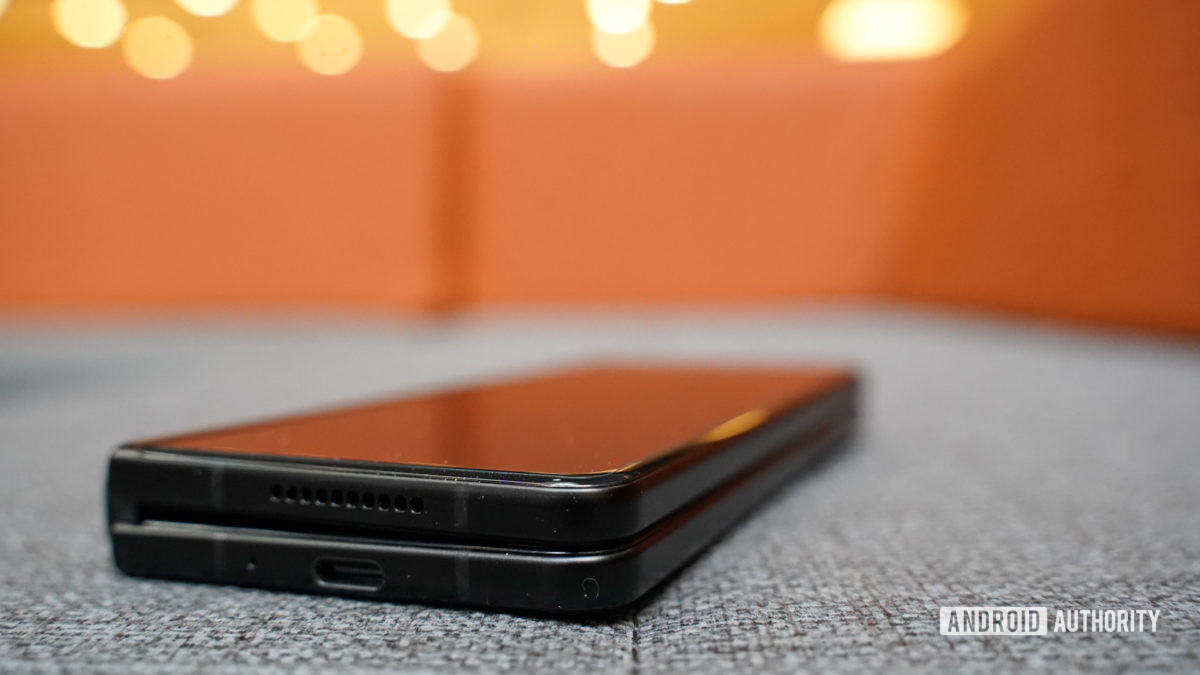 Samsung Galaxy Z Fold 3 bottom edge on a couch.