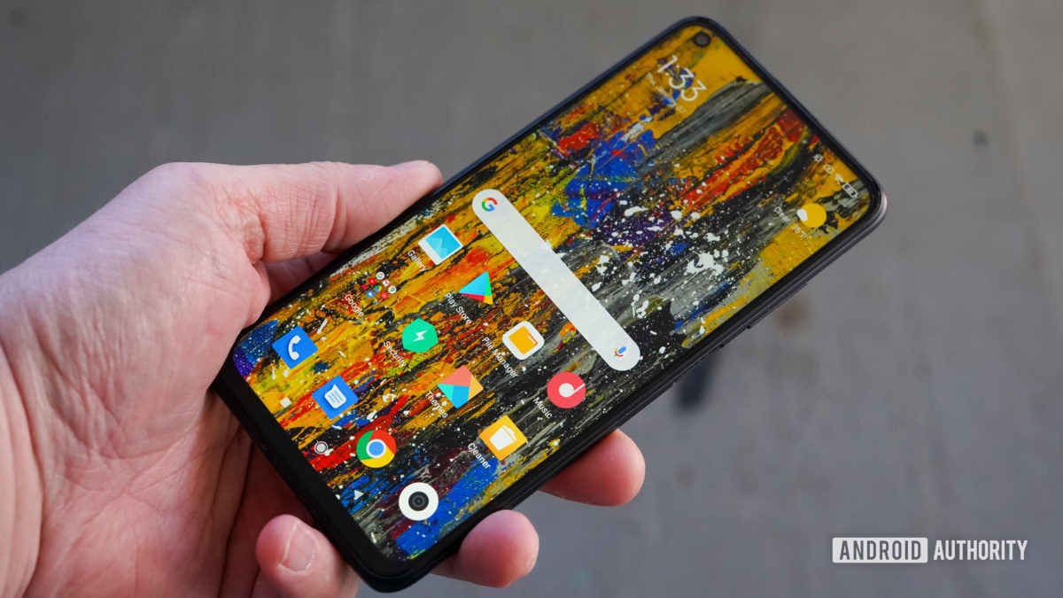 Xiaomi Redmi Note 9T in hand showing the screen.