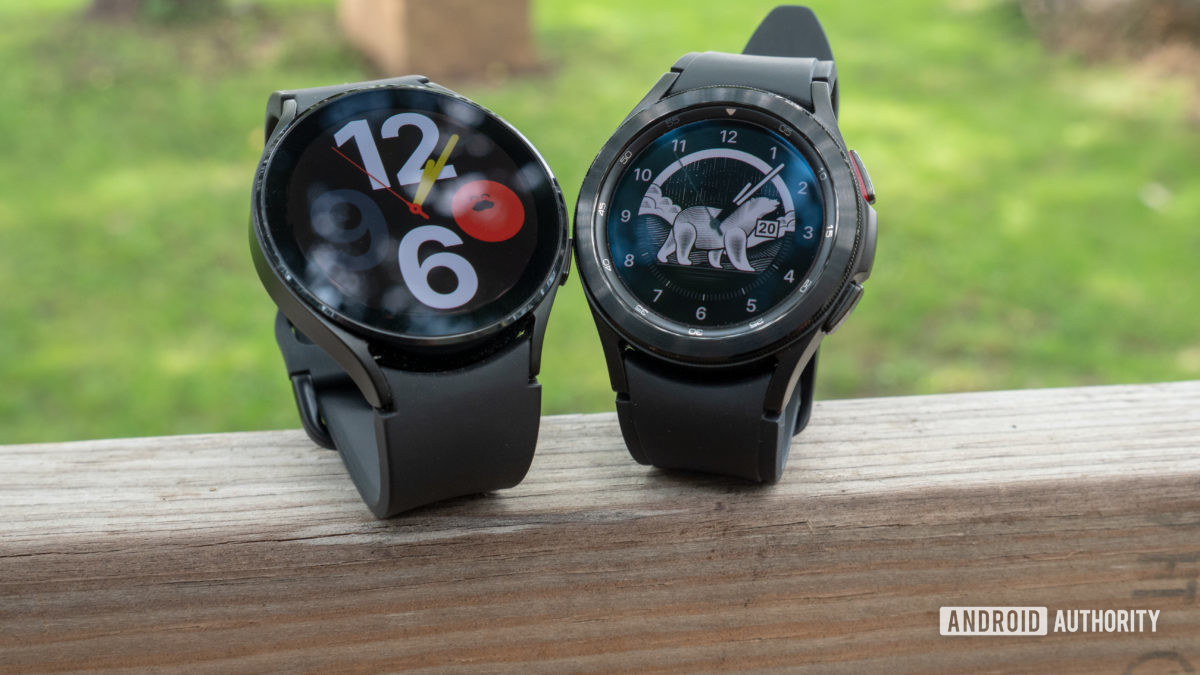 The Samsung Galaxy Watch 4 and Samsung Galaxy Watch 4 Classic on a fence.