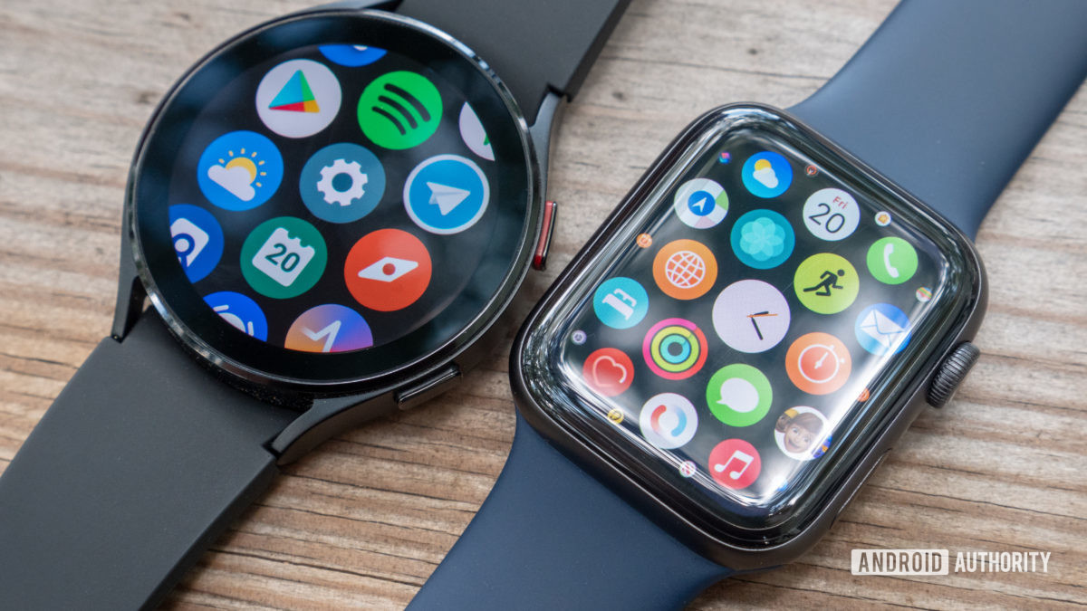 The Samsung Galaxy Watch 4 and Apple Watch Series 6 lying on a table showing the all-apps page.