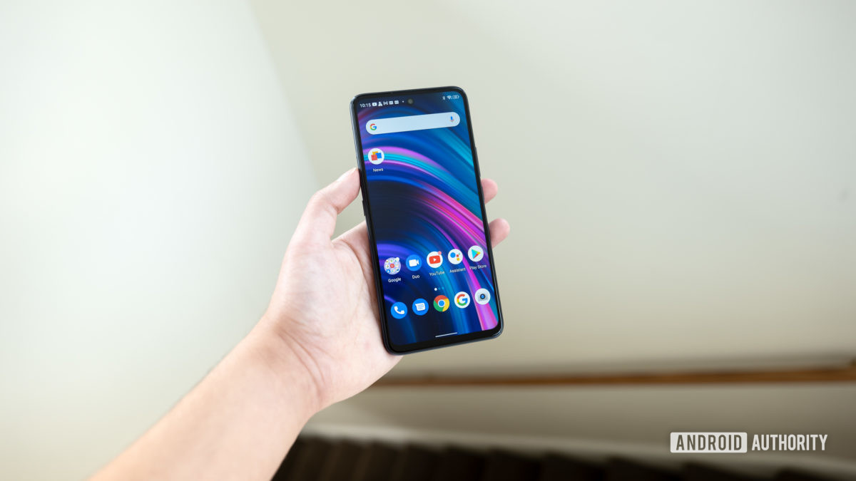 Man holding Blu G91 Pro in hand