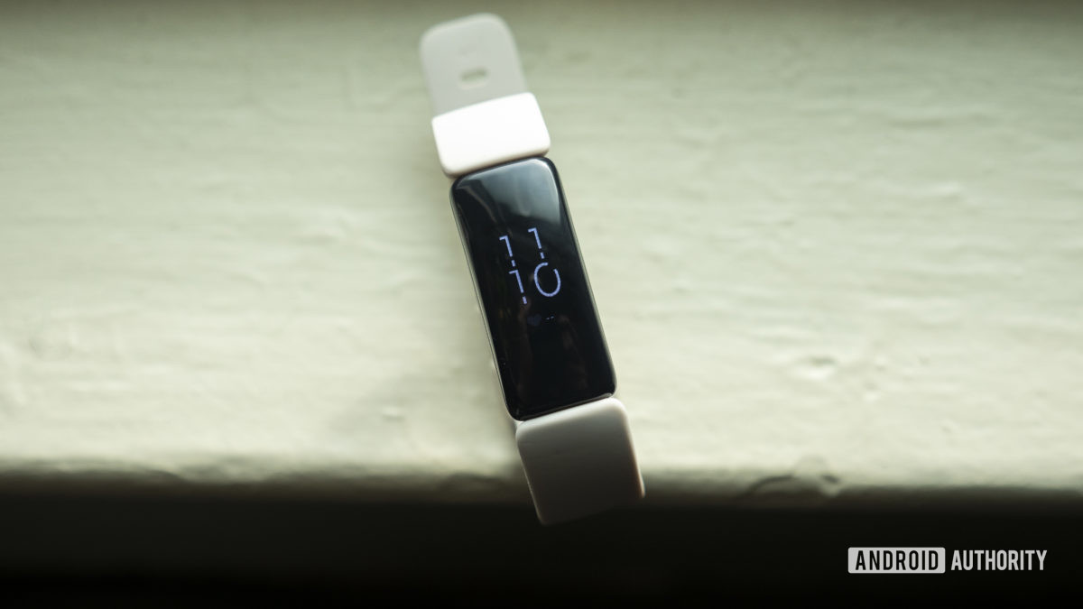 fitbit inspire 2 review fitness tracker display on table 1