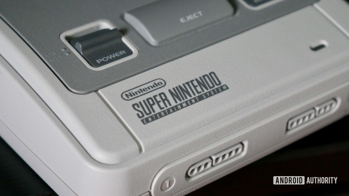 super nintendo snes console showing a closeup of the logo