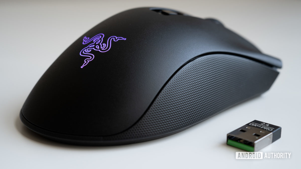 Razer Deathadder V2 Pro next to USB dongle