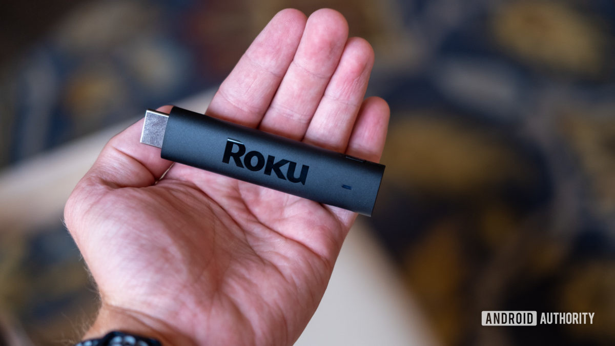 roku streaming stick 4k in hand