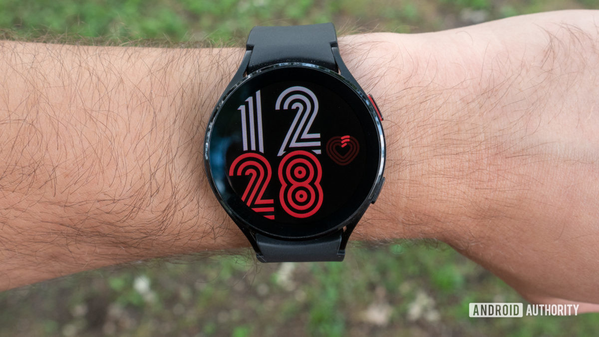 The Samsung Galaxy Watch 4 on a wrist showing the watch face