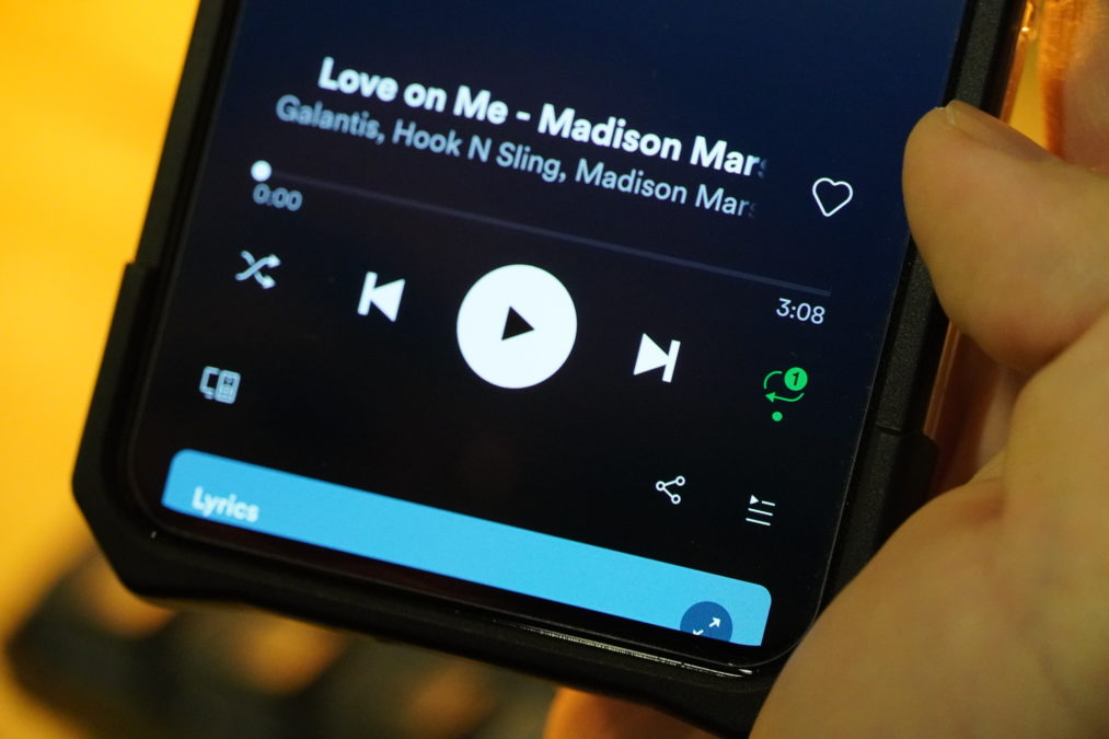 photo of a song on repeat in the Spotify mobile application