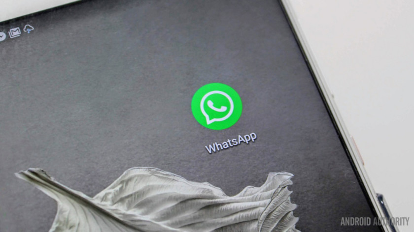 A WhatsApp app icon closeup on a smartphone.