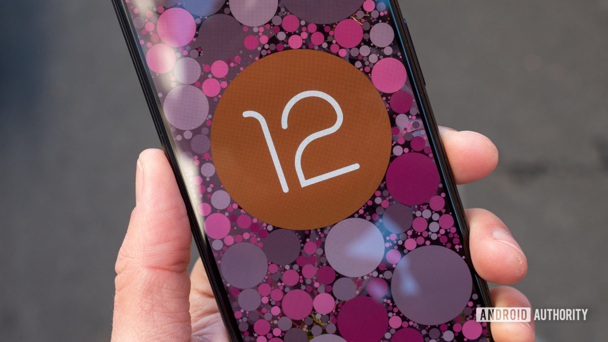 The Google Pixel 6 in hand showing the Android 12 easter egg logo