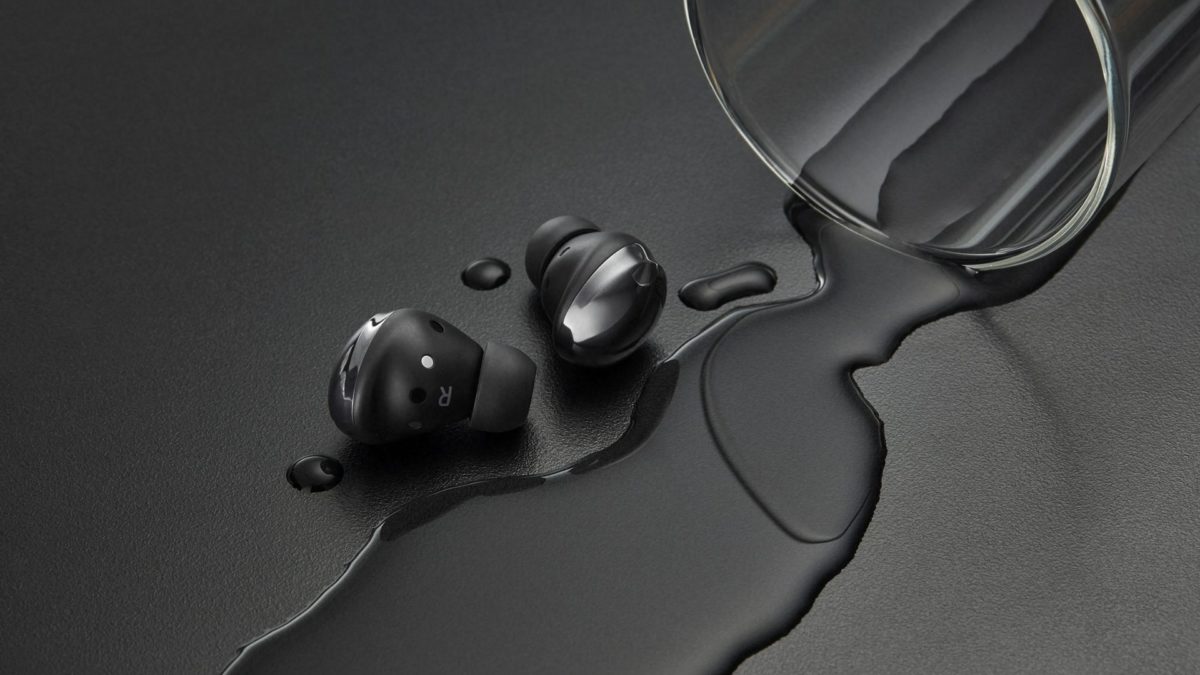 The Samsung Galaxy Buds Pro, black, withstand a water spill.