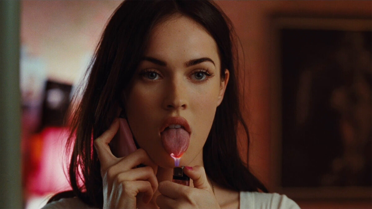 Megan Fox holds a lighter to her tongue in Jennifers Body - new on amazon prime video in July