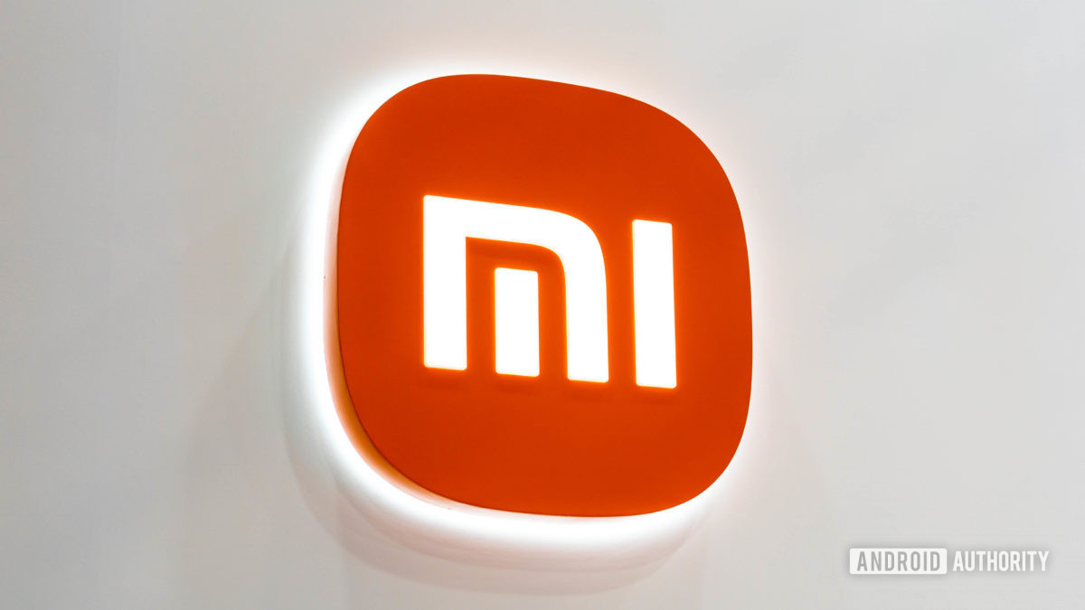 Xiaomi Mi logo on white wall