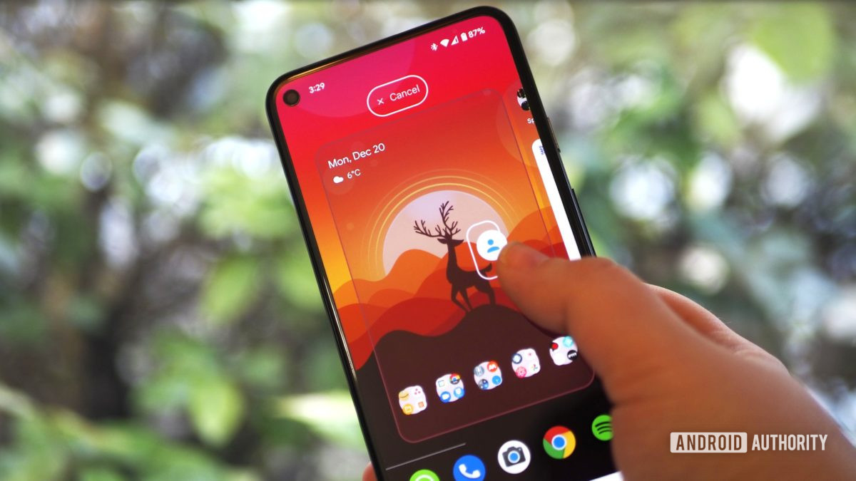 Pixel 5 on a green nature background, showing the launcher homescreen and gesture to break away an in-app shortcut into a separate icon
