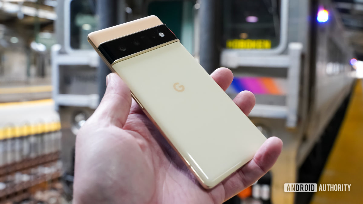 Google Pixel 6 Pro left rear profile in front of train