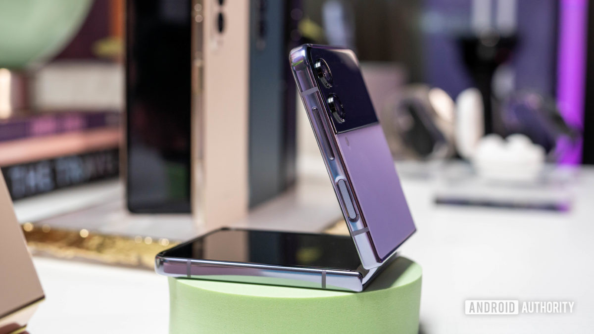 Samsung Galaxy Z Flip 4 in Bora Purple color in clamshell mode side angle view Samsung Galaxy Z Flip 4 in Bora Purple color in clamshell mode side angle view