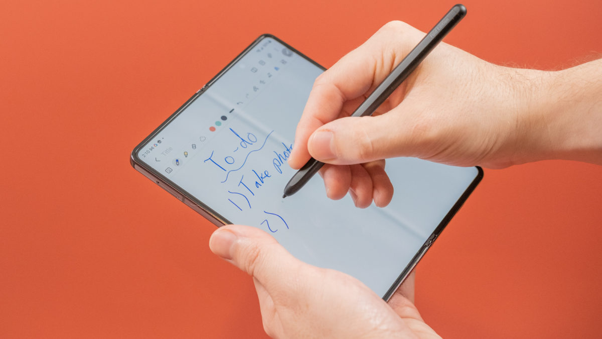 Holding the Galaxy Z Fold 4 and taking notes with the S Pen