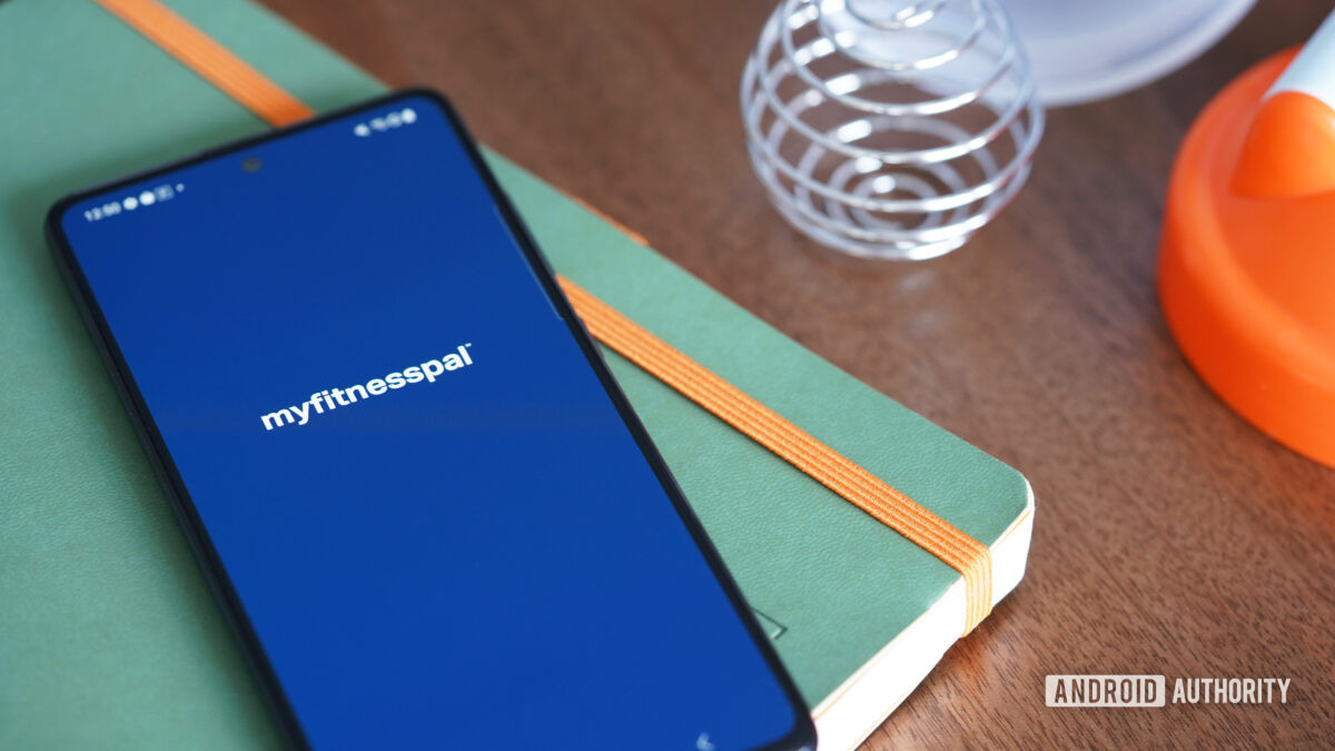 A Samsung Galaxy A51 displays the MyFitnessPal app's opening screen.