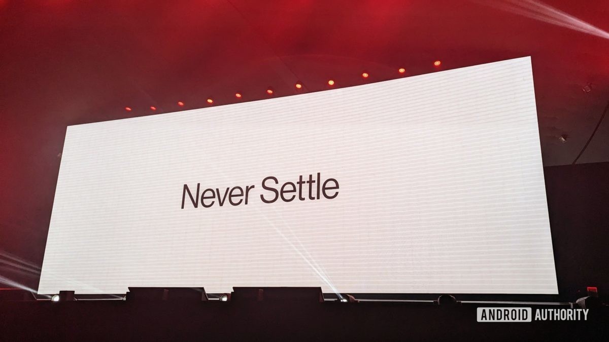 OnePlus NeverSettle Logo On Stage At OnePlus 11 event