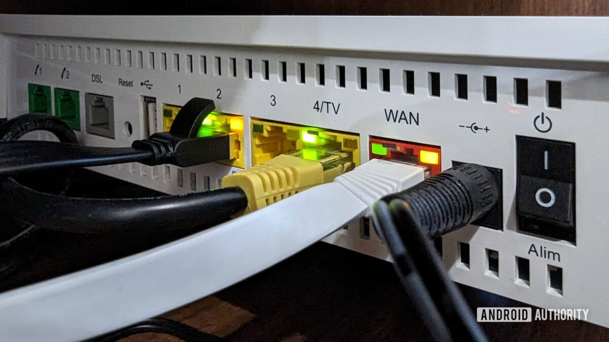 Router ports with Ethernet cables plugged in