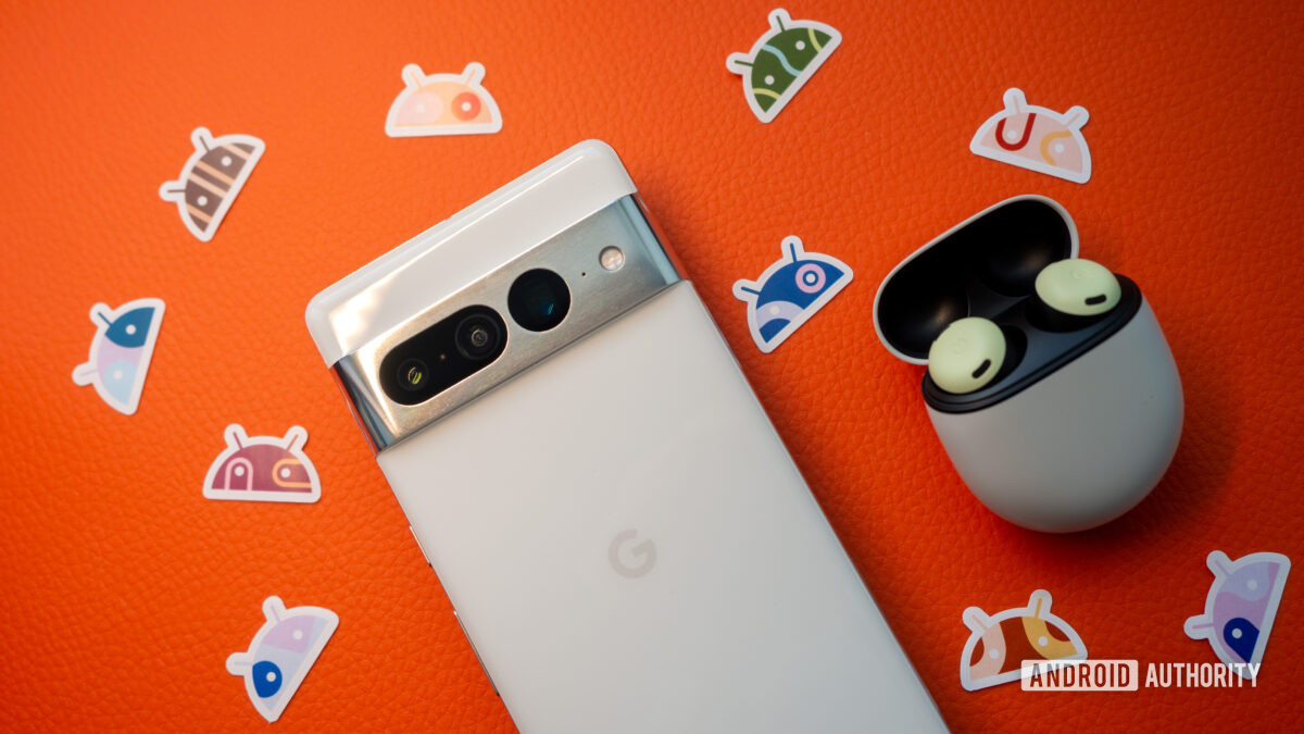 Google Pixel 7 Pro in white and Pixel Buds Pro on an orange background, with Android stickers next to them