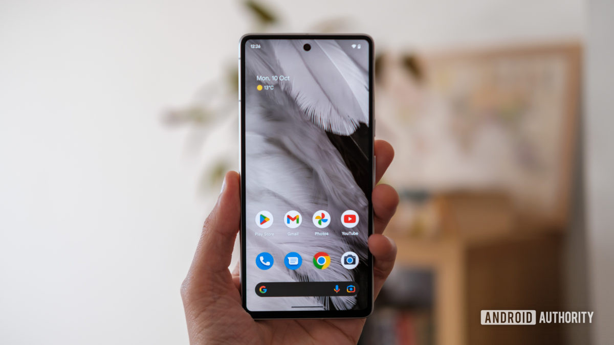 Google Pixel 7 home screen in hand