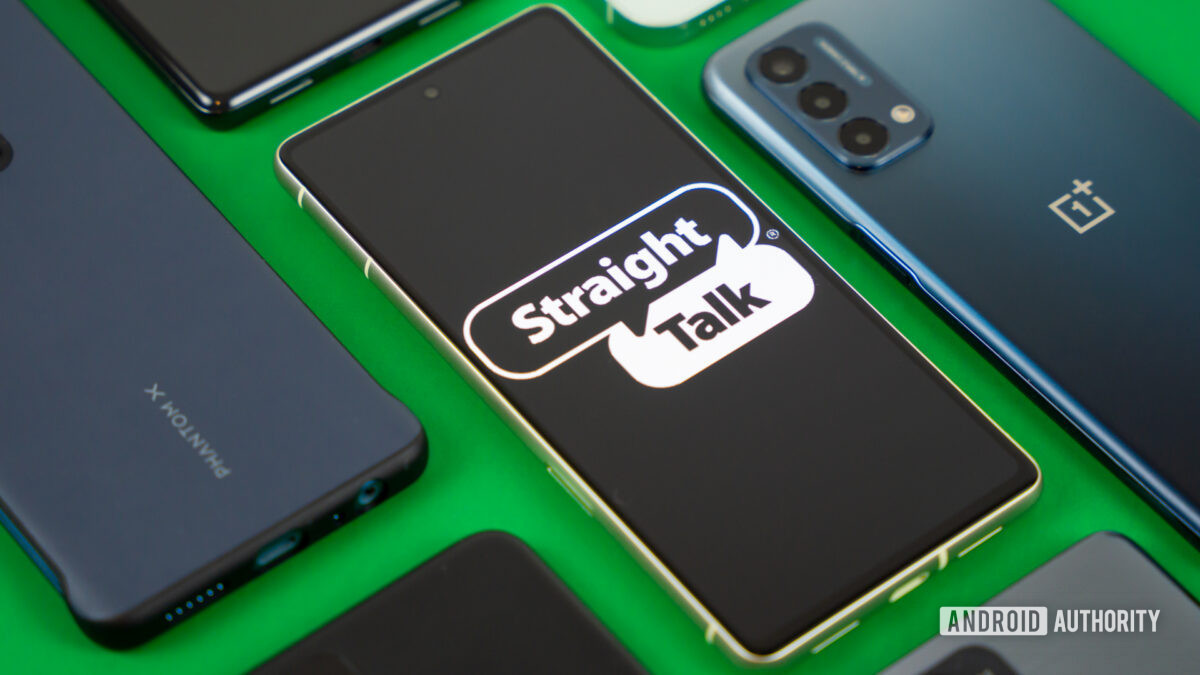 Stock photo of Straight Talk logo on phone with many devices 3
