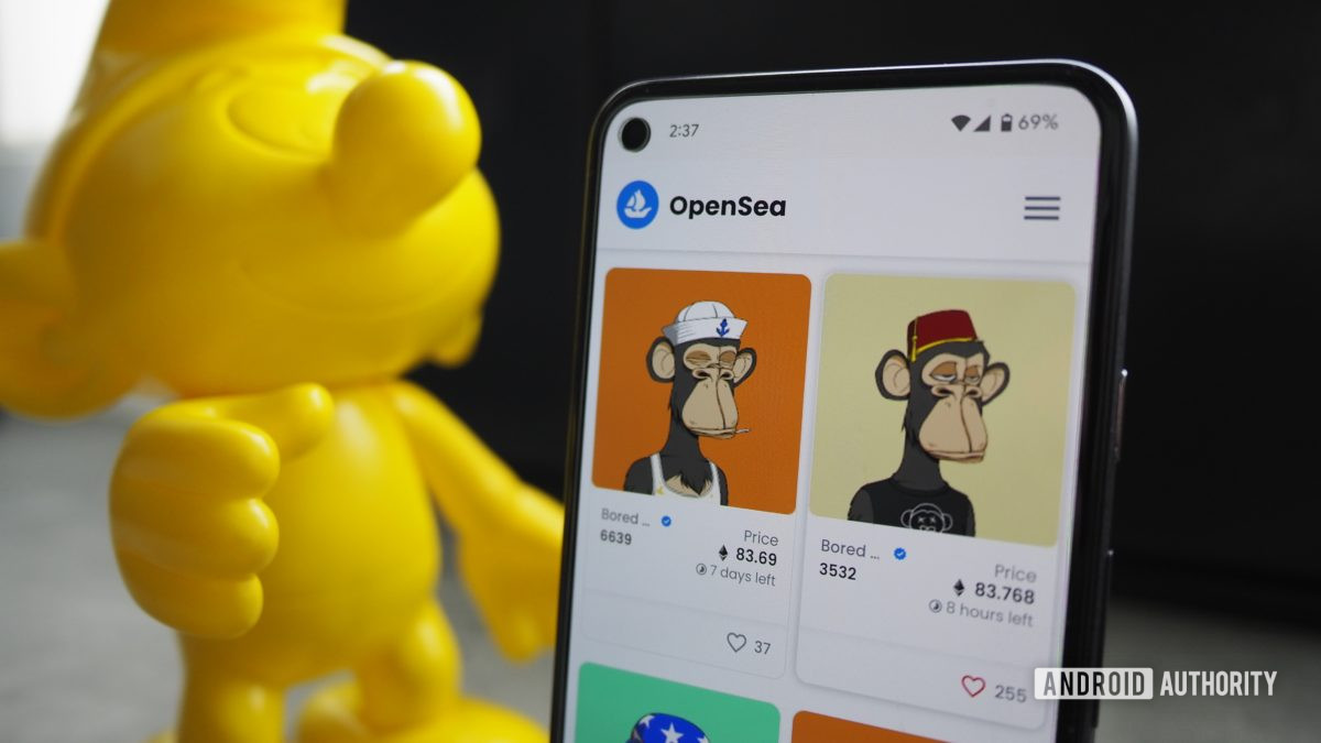 Opensea BoredApe NFTs shown on a Pixel 5 with a yellow smurf in the background