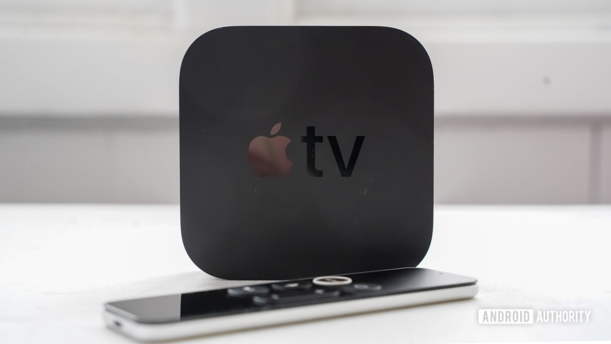 Apple TV 4K standing with remote