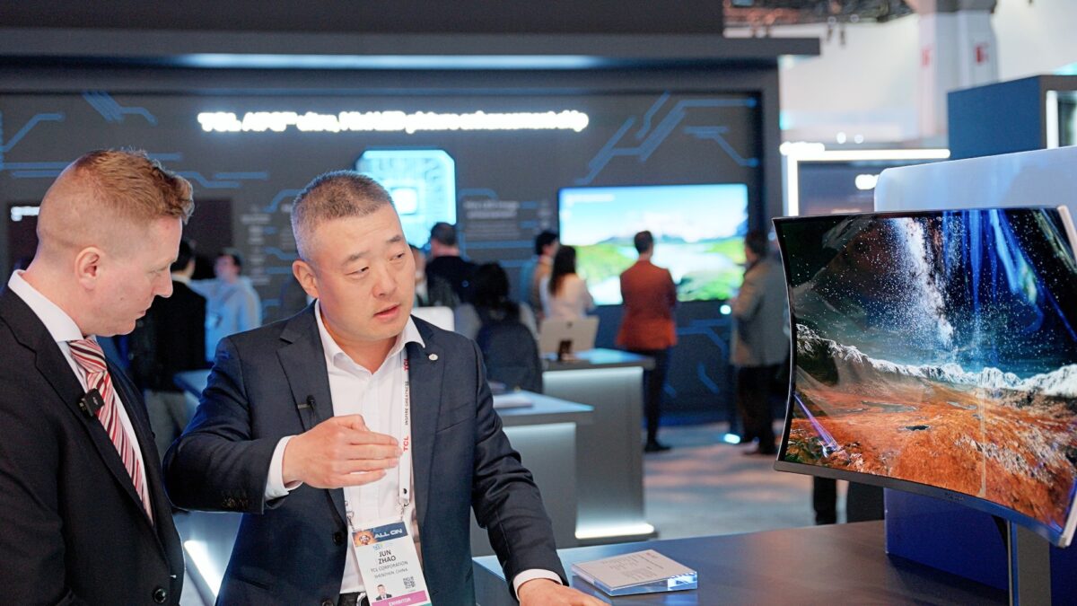 TCL CSOT CEO being interviewed in front of display