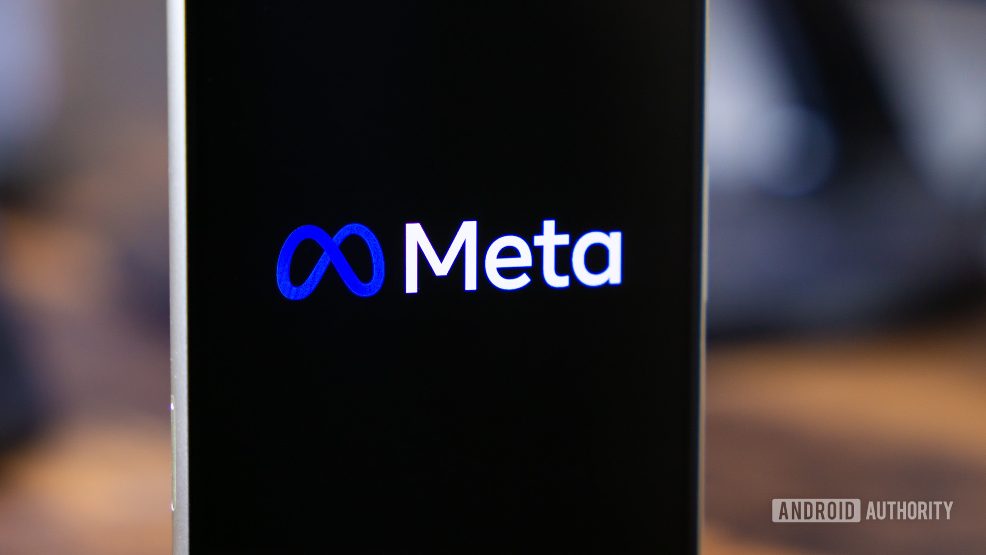 Meta logo on smartphone stock photo (10)