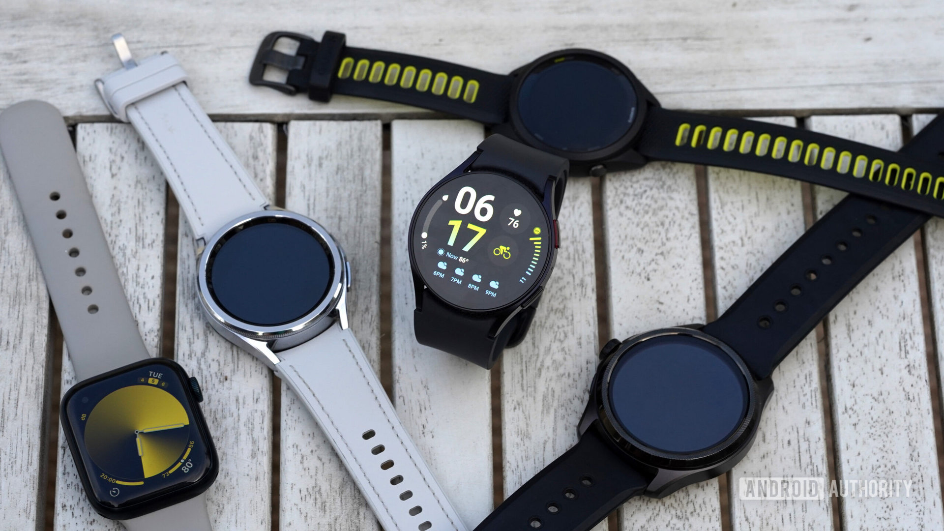A Samsung Galaxy Watch 6 rests among competitors from the wearables market.