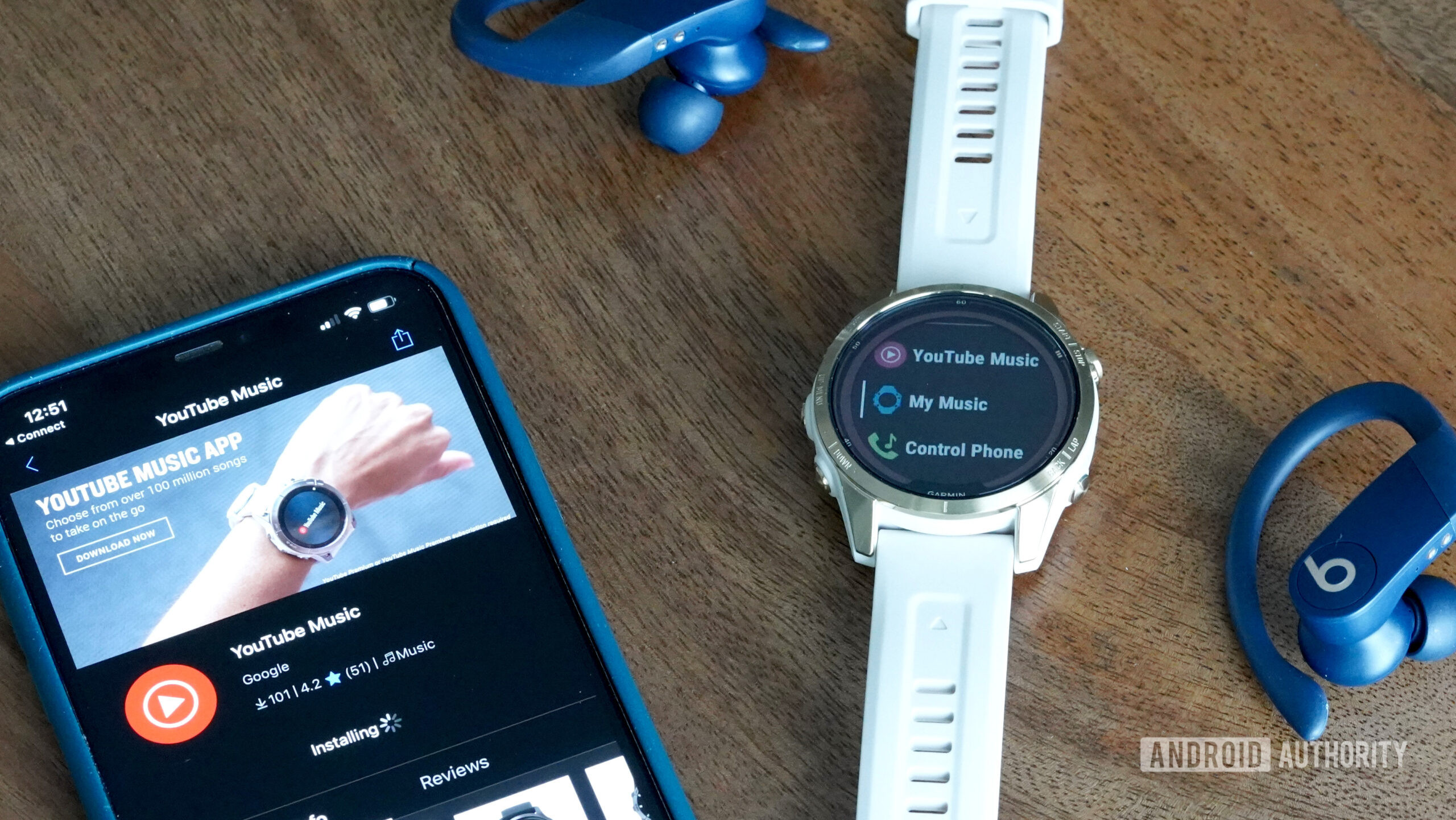 A user adds the Garmin YouTube Music App to their Fenix 7 via the Connect IQ app. 