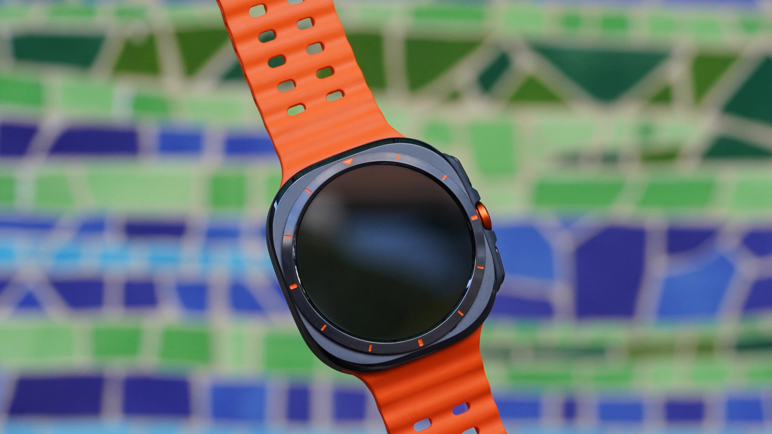 The Samsung Galaxy Watch Ultra features a squircle watch case and orange detailing.