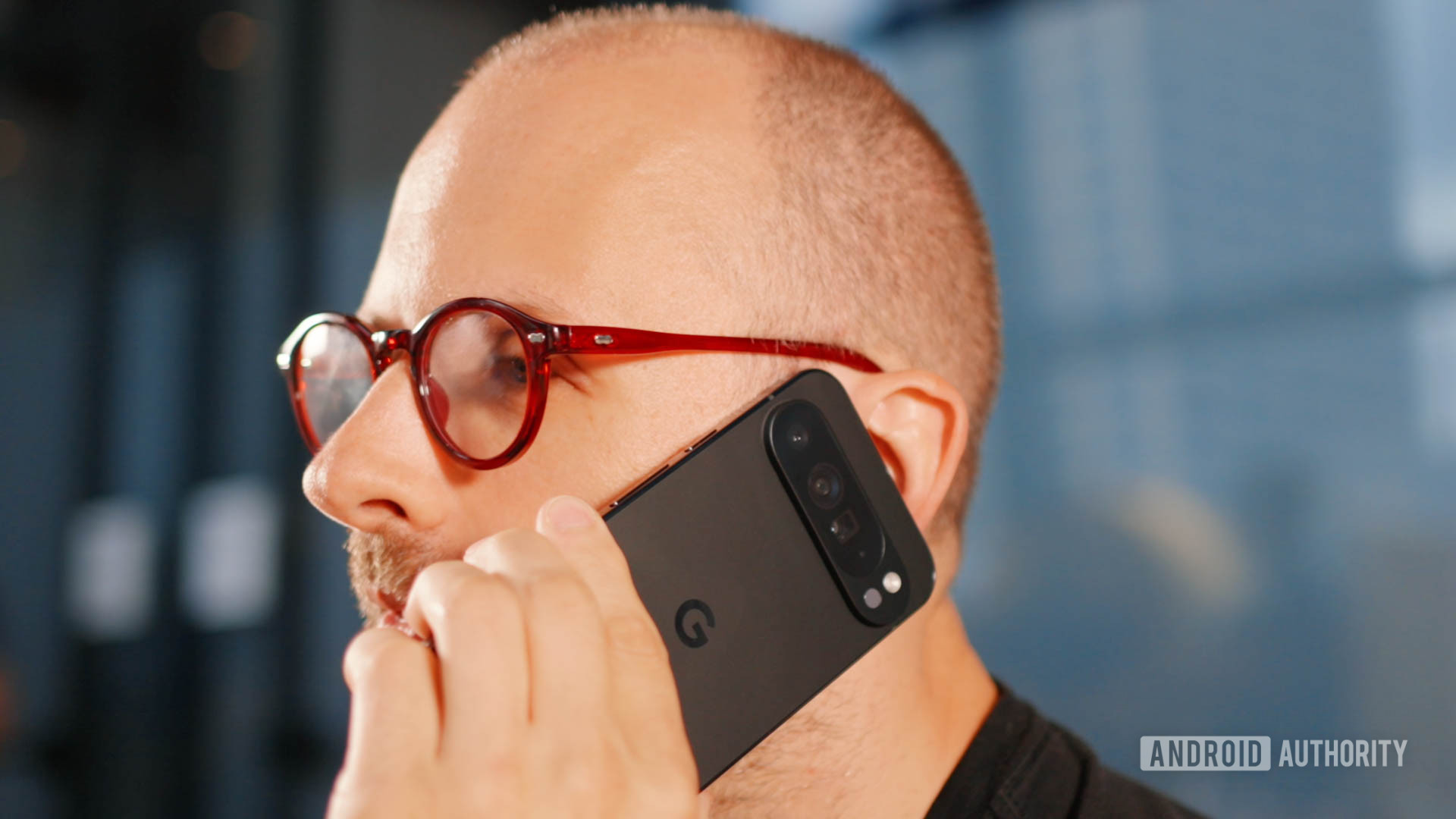 Pixel 9 Pro in a man's left hand, talking on the phone