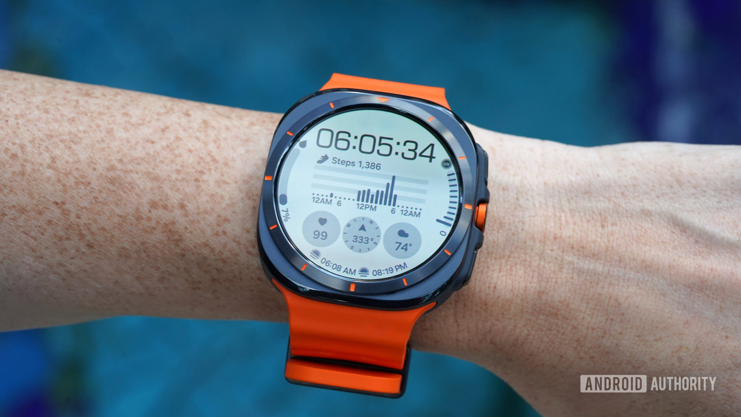 A Samsung Galaxy Watch Ultra displays a native watch face.