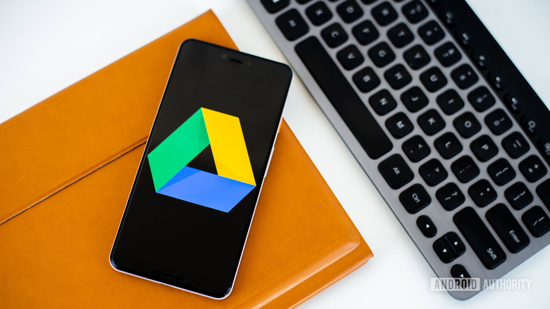Google Drive logo on smartphone stock photo 2 Google Drive logo on smartphone stock photo 2