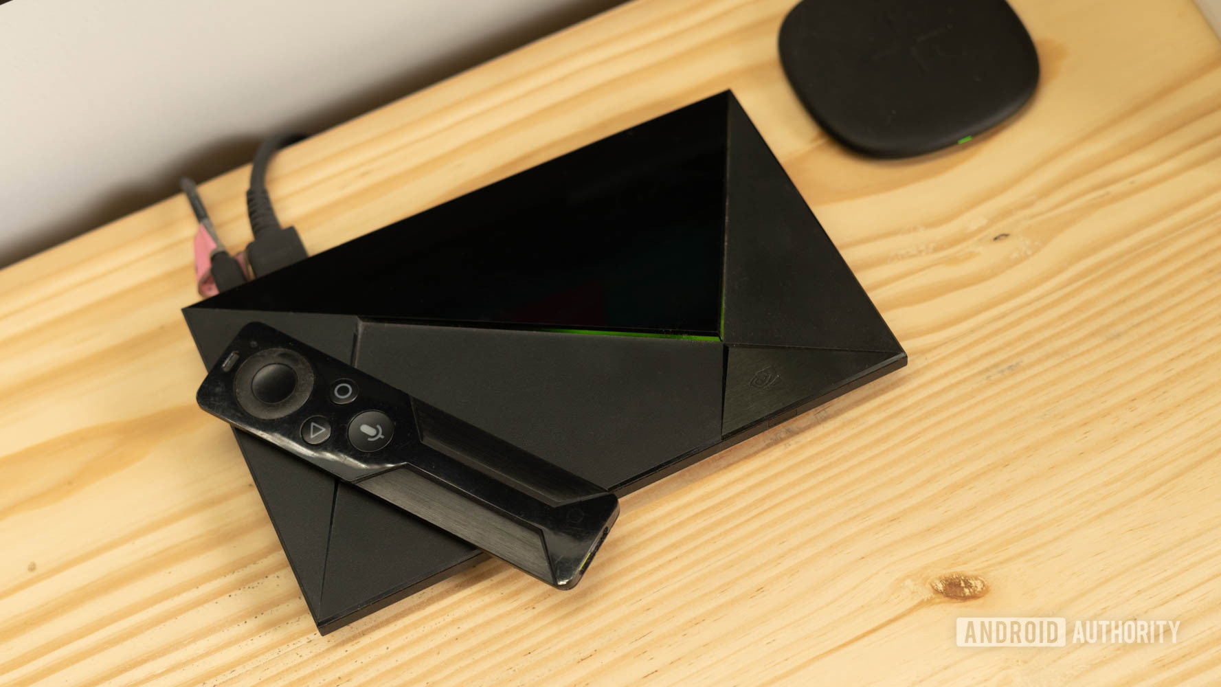 NVIDIA Shield 2015 top down view with original remote NVIDIA Shield 2015 top down view with original remote