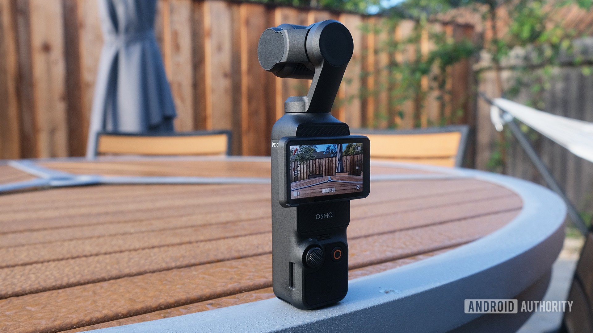 DJI Osmo Pocket 3 on table with display in landscape mode DJI Osmo Pocket 3 on table with display in landscape mode