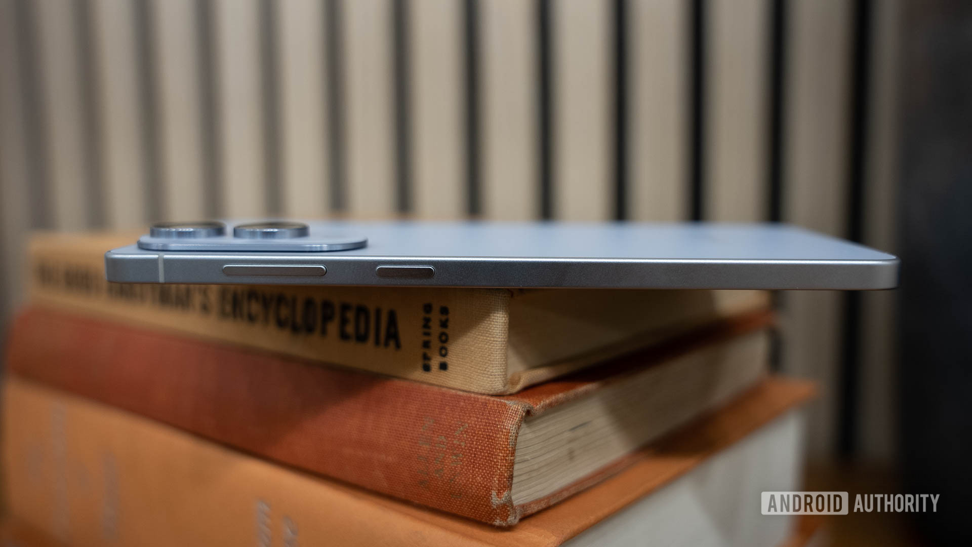 Samsung Galaxy S25 Edge Thickness Shown on top of Books Samsung Galaxy S25 Edge Thickness Shown on top of Books