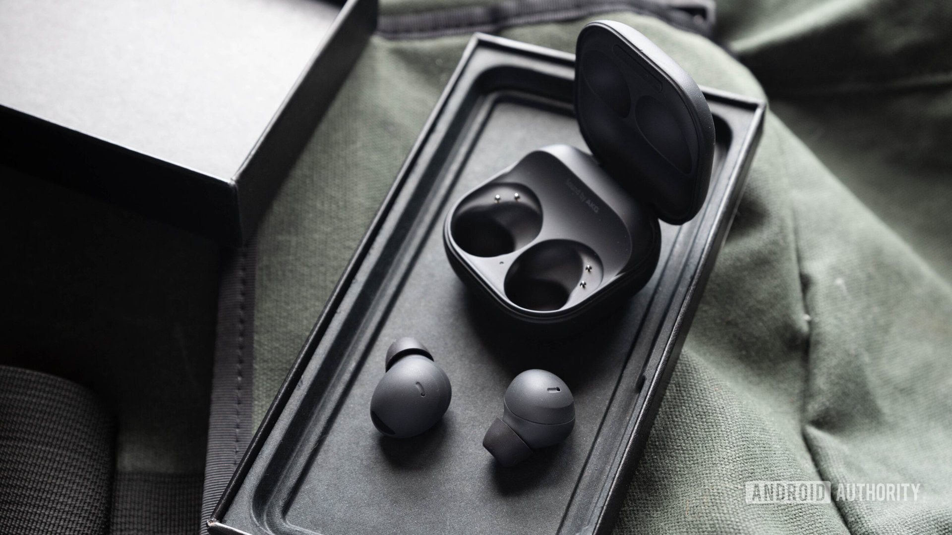 samsung galaxy buds 2 pro earbuds 4 The samsung galaxy buds 2 pro earbuds outside of the open case.