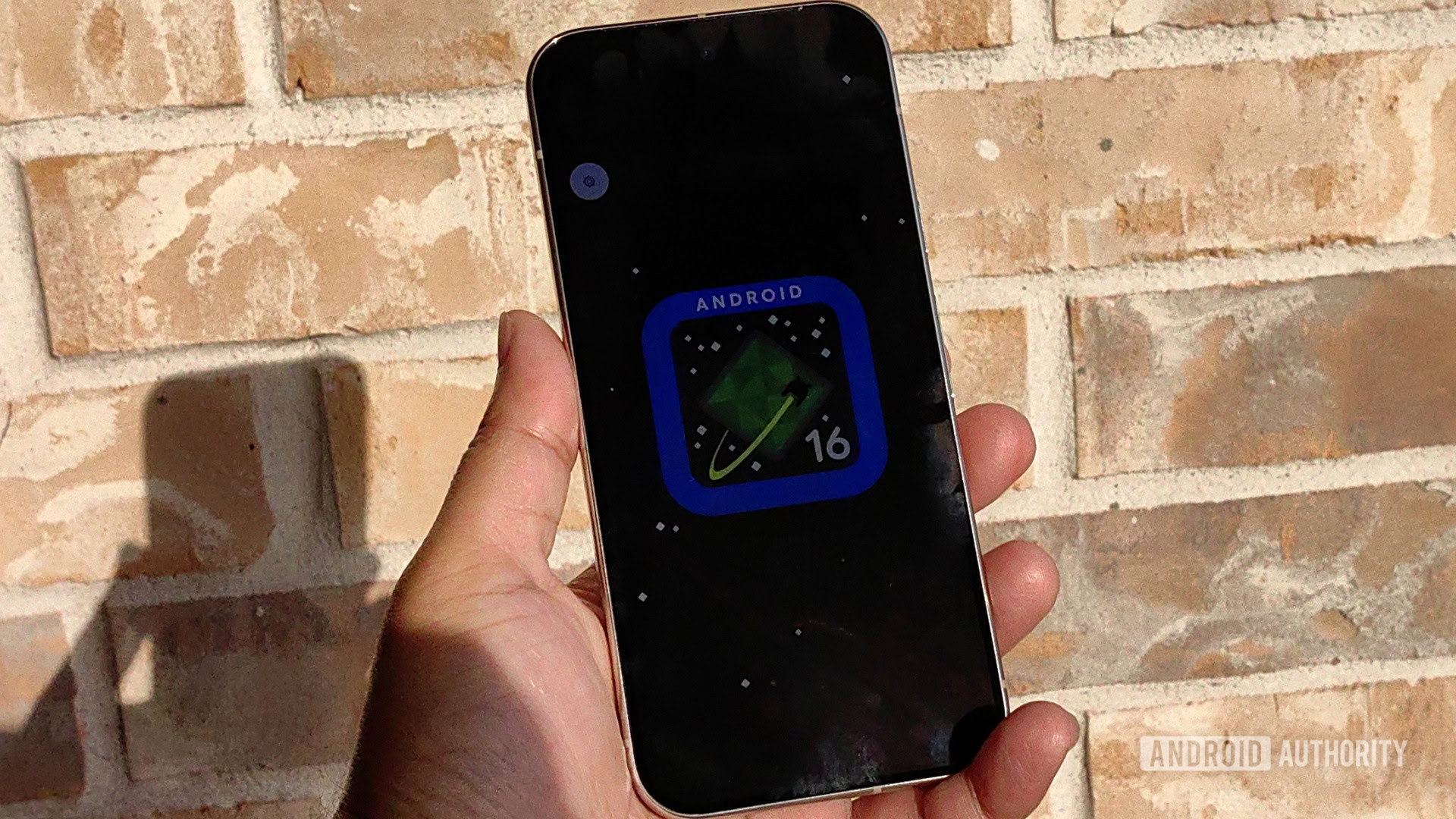 The Android 16 logo on a display Pixel display The Android 16 logo on an Extra Dim Pixel display