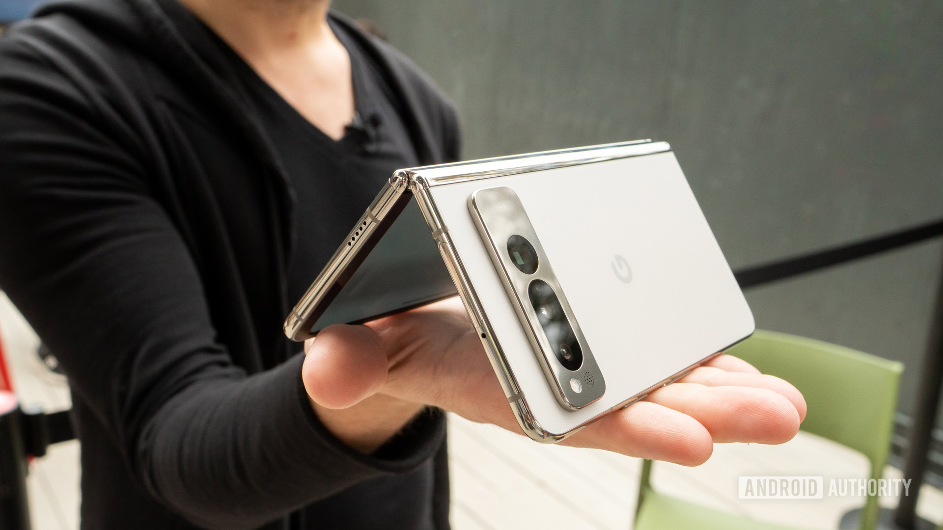 Google Pixel Fold half closed on palm 3 Google Pixel Fold half closed on palm 3